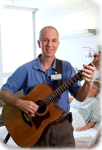 Artist-in-Resident John Morgan playing guitar